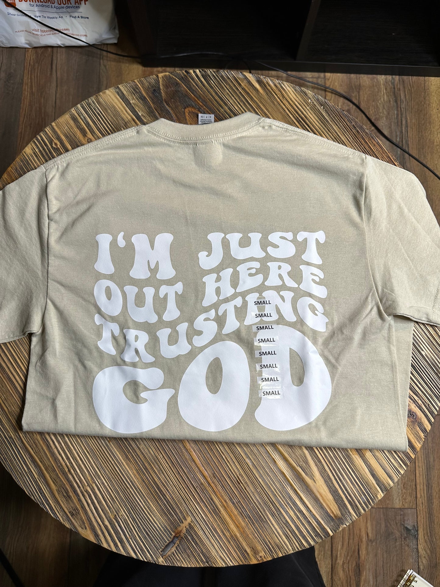 Out Here Trusting God Graphic Tee